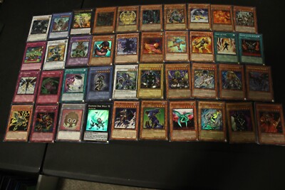 50 EX-DMG Foil Yugioh Card Lot(The Winged Dragon of Ra JUMP, Kuriboh MRD+)-image