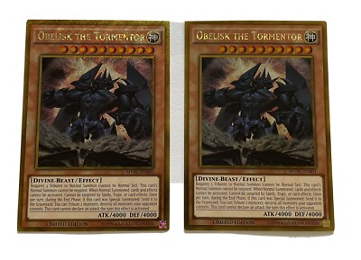 YU-GI-OH 1st EDITION OBELISK THE TORMENTOR MVPC EN001 X2, GOLD/SECRET GOLD RARE-image