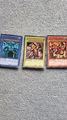 The Winged Dragon Of Ra Obelisk the Tormentor and Slifer the sky Dragon Yu-Gi-oh-image