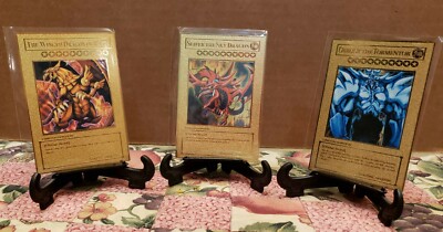 Yu-Gi-Oh 3 Egyptian Gods :The Winged Dragon Of RA ,Slifer The Sky Dragon And...-image
