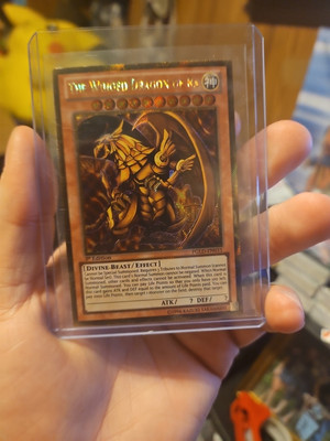 The Winged Dragon of Ra PGLD-EN031 Premium Gold 1st Edition Nm-image