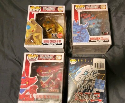 Signed Yugioh Funko Pops Blue Eyes White Dragon , Slifer, Ra, Obelisk with COA-image