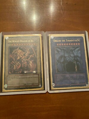 Two Yu-Gi-Oh God Cards - Obelisk The Tormentor & The Winged Dragon of Ra-image