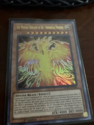 *** THE WINGED DRAGON OF RA - IMMORTAL PHOENIX *** ULTRA RARE DUPO-EN046 YUGIOH!-image