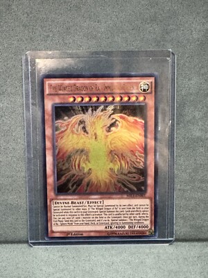 Yugioh The Winged Dragon Of Ra - Immortal Phoenix MIL1-EN001 1st Edition NM-image